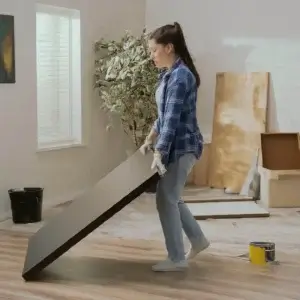 woman moving apartment furniture